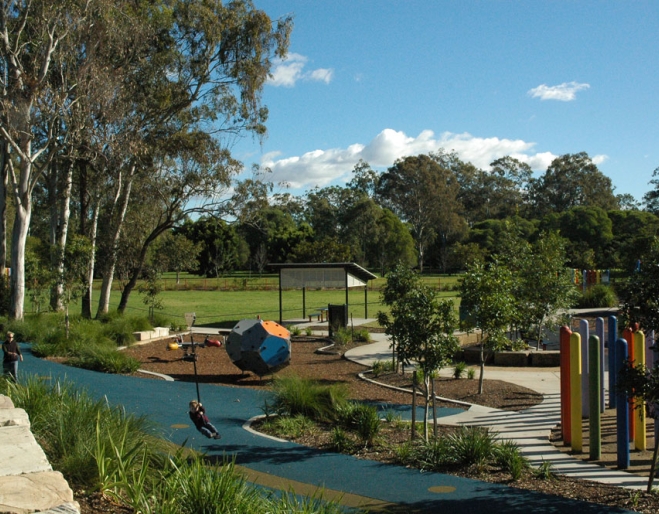 Flying fox in playground surrouned by park and forest inside Capalaba Regional Park.
