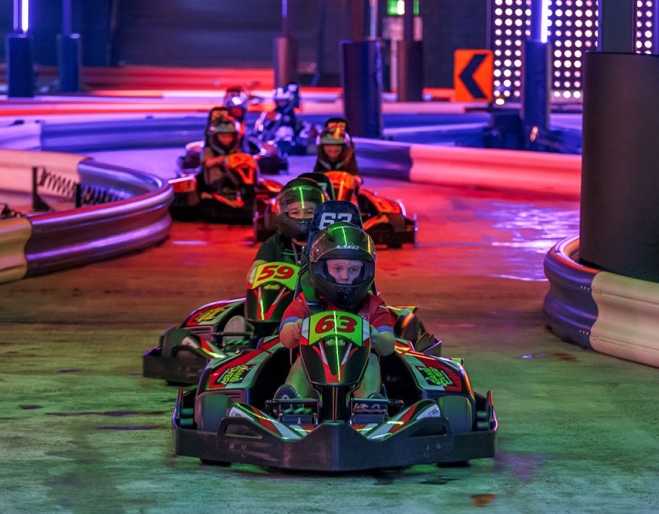 Game Over Brisbane kids in go-karts at Game Over