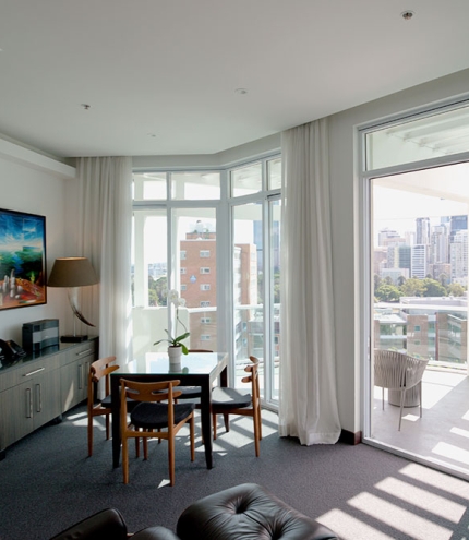 The Point Brisbane Hotel Kangaroo Point Hotel room with view, table & Chair The Point Brisbane Hotel