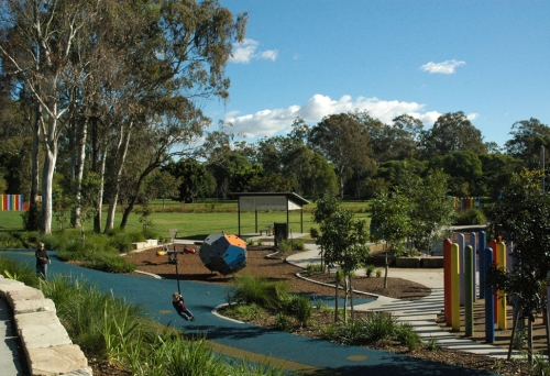 Flying fox in playground surrouned by park and forest inside Capalaba Regional Park.