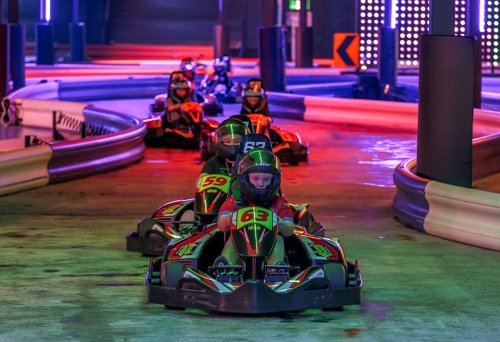 Game Over Brisbane kids in go-karts at Game Over