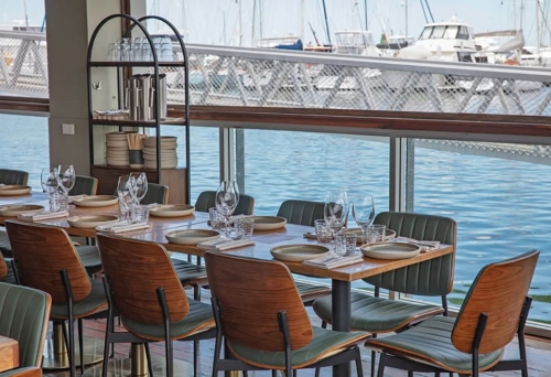 Tables overlooking water at Wang Chung 