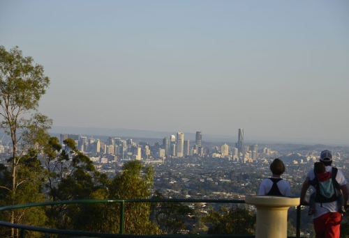 Mt Gravatt Lookout People standing on Mt Gravatt Lookout with views on to Brisbane city buildings.