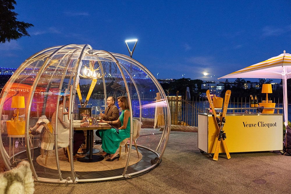 Veuve Clicquot Chalet Customs House People in igloo Veuve Popup