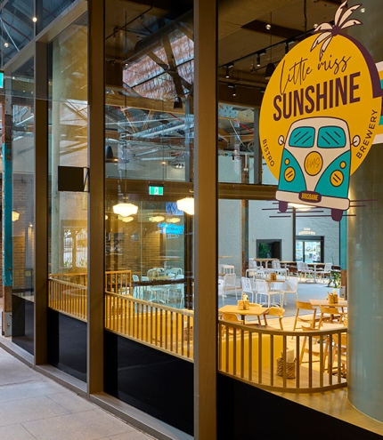Little Miss Sunshine Brisbane CBD front window with signage at Little Miss Sunshine Brisbane CBD