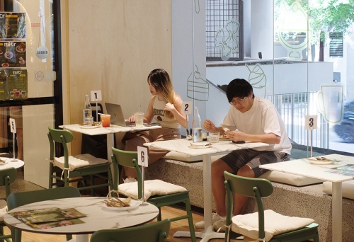 Mitr Dessert House Brisbane CBD Customers sitting in window of Mitr Dessert House