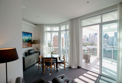 Hotel room with view, table & Chair The Point Brisbane Hotel