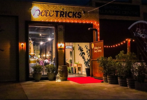 New Tricks Albion Exterior entry to New Tricks Albion by night