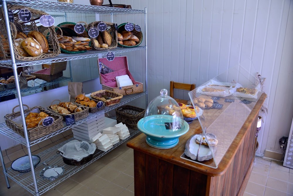 Crust and Co. Bread and pastries displayed on counter inside Crust and Co.